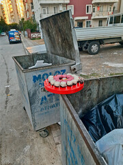 heartbreak, valentine's day gift thrown in the trash