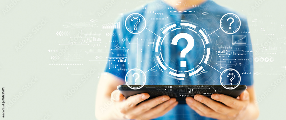 Poster question marks with young man using a tablet computer