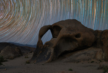star trails over cyclops arch in Alabama Hills California