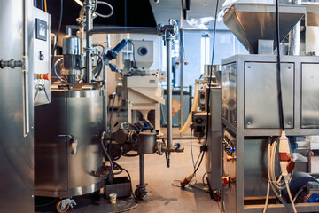 Manufacturin for automatic production of chocolate. Sweets modern factory. Food industry, automated technology equipment and engineering concept.