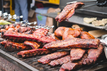 smoker with meat at street food festival
