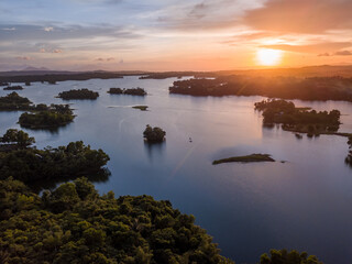 Scenic Aerial Panorama Drone Picture of Islands in the Lumot Lake near Caliraya, Cavinti, Laguna, Philippines during Sunset