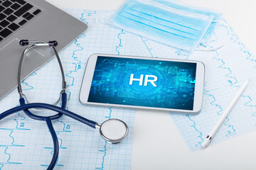 Close-up view of a tablet pc with medical abbreviation