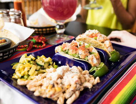 Cinco: Plate Of Delicious Shrimp Tacos With Fresh Toppings
