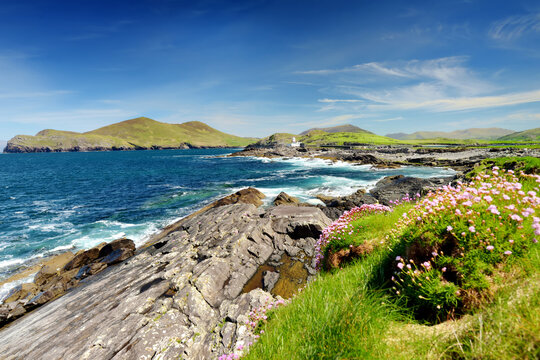 Beautiful view of Valentia Island Lighthouse at Cromwell Point. Locations worth visiting on the Wild Atlantic Way. Scenic Irish countyside on sunny summer day, Ireland