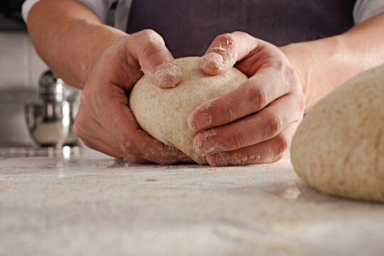 Pastry Chef Kneading Dough