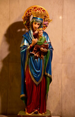 Closeup of Our lady of perpetual help statue virgin Mary with Child Jesus in the church, Thailand. selective focus.