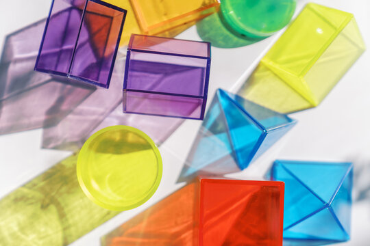 colorful shadows from bright acrylic shapes