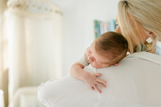 Baby on his mother's shoulder