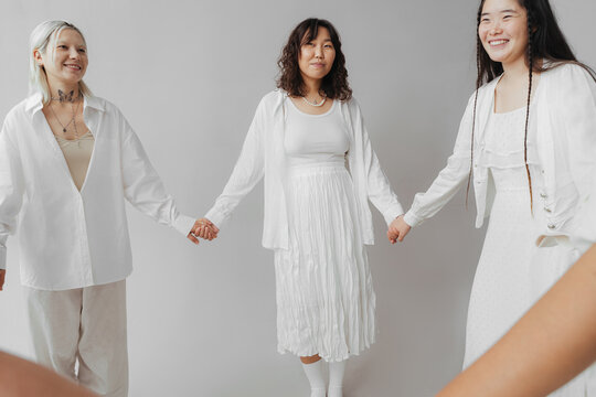 happy asian women dance round dance