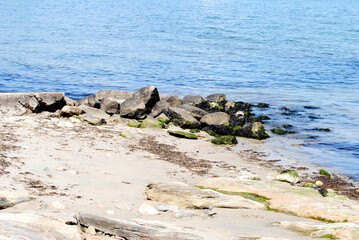 Rocky Shore with Very Blue Still Water	
