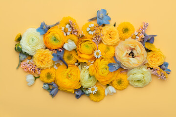Bright yellow floral flatlay