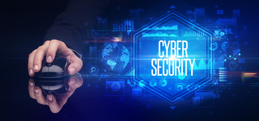 hand holding wireless peripheral, cyber security concept