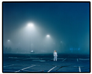 Astronaut looking at night sky