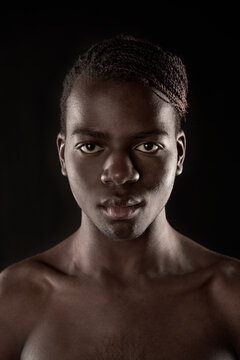 Emotionless black male looking at camera