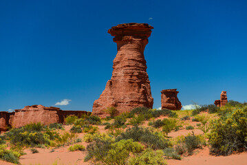 A sandstone hoodoo and the moon at Talampaya National Park, La Rioja Province, Argentina
