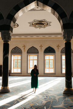 hijabi woman inside a mosque