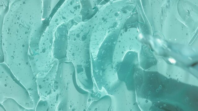 Hyaluronic acid gel texture fluid with oxygen bubble footage. Cosmetic skincare transparent lotion toner beauty product with peptide and retinol. Antibacterial sanitizer abstract background video 4k