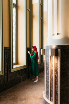 hijabi woman inside a mosque