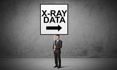 Obraz premium business person holding a traffic sign