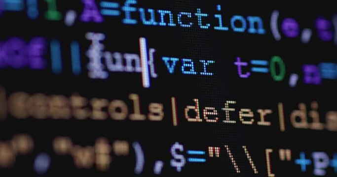 4K Close up shot programming tag code on PC Monitor scroll down. Background concept for programming and coding web development.