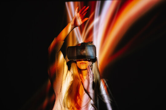 Woman having fun in virtual space 