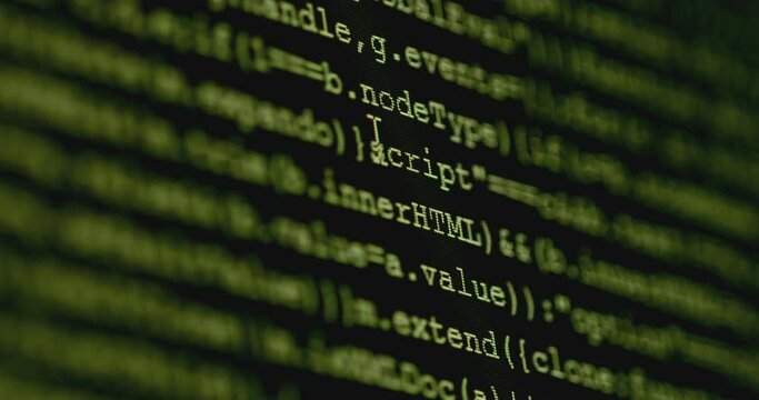 4K Close up shot programming tag code on PC Monitor scroll down. Background concept for programming and coding web development.