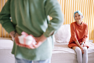 Happy woman expecting for birthday gift 