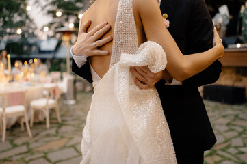 anonymous couple dancing together at festive party