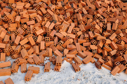 Fototapeta A bunch of red bricks