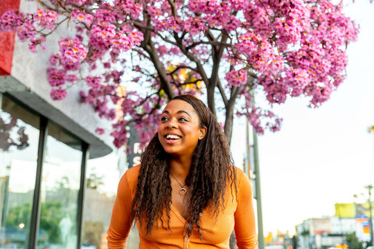 Woman Smiling Walking In The City