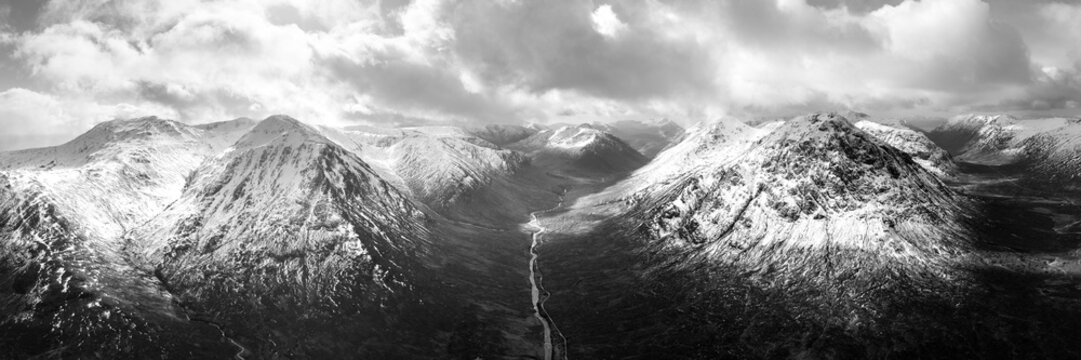 Glen Etive valley skyfall road in winter snow scottish highlands