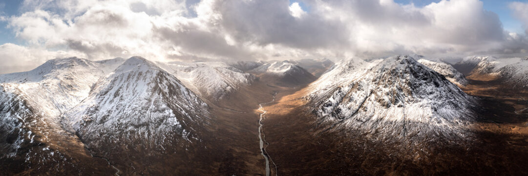 Glen Etive valley skyfall road in winter snow scottish highlands