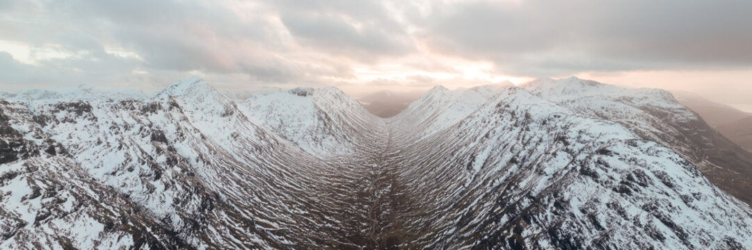 Lairig Gartain valley at sunset in winter Glencoe