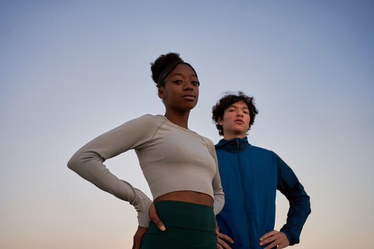 Diverse sportspeople standing during outdoor training