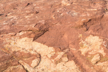 Red sandstone is a large stone used for landscaping, decorating the garden to look natural with man-made and many patterns on the surface.