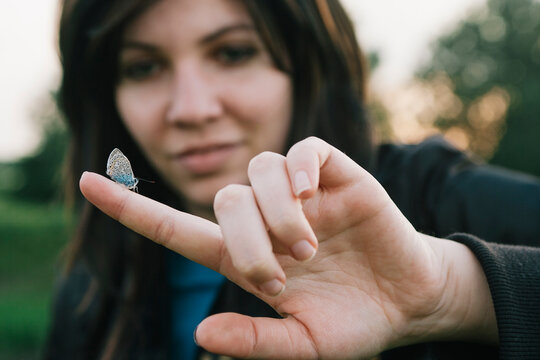 A buttefly on female hand
