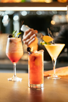 Appetizing refreshing cocktails in glasses in bar