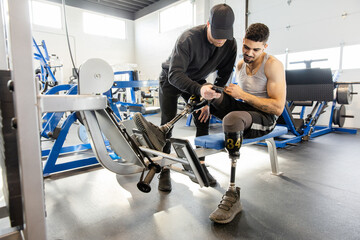 Trainer Shows Double Leg Amputee Phone