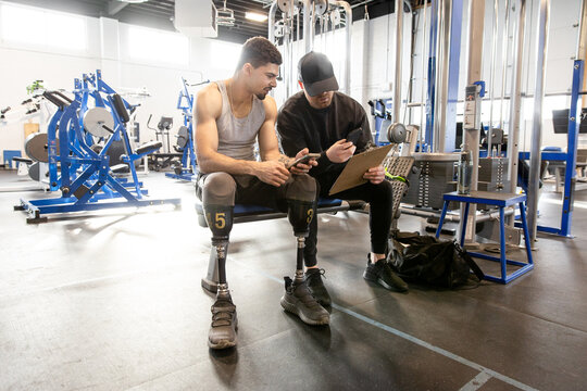 Trainer Shows Double Leg Amputee Phone