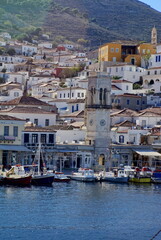 Fototapeta na wymiar Town on the hill above the harbor on Hydra, Greek Isles