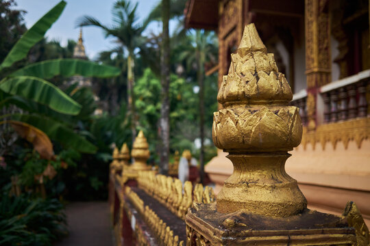Detail Of A Golden Statue At A Temple In Xishuangbanna, Yunnan, China.