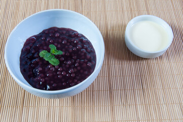 pot with a delicious sagu on the table
