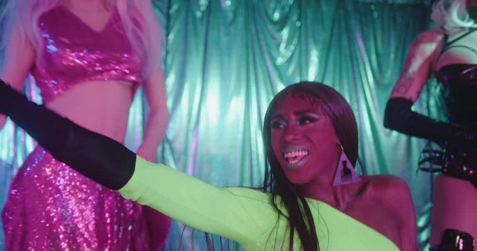 Group of Drag Queens Performing Show on Stage