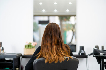 Female client sitting in beauty studio