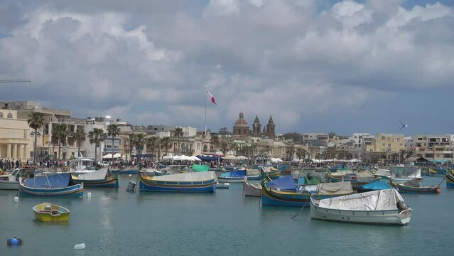 Marsaxlokk, Malta with brightly painted boats