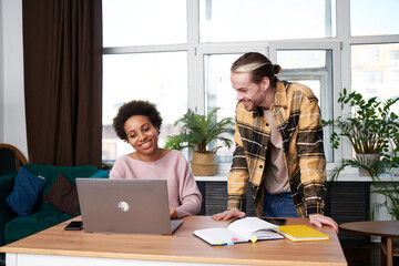 Friends studying at home