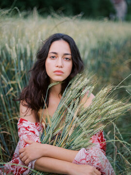 Woman Holding Green Wheat