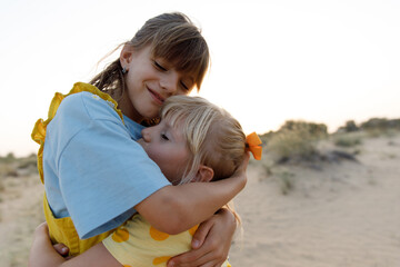 Sisters hugging each other