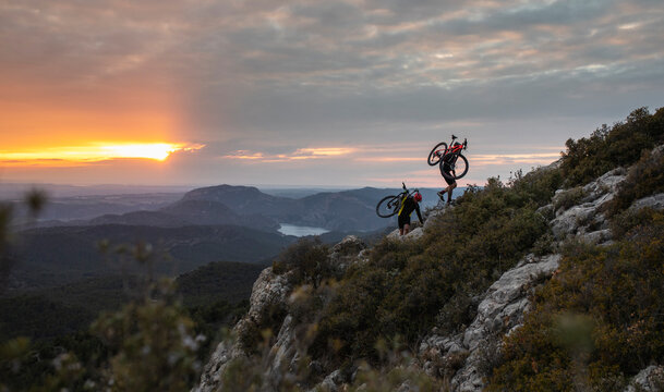 Mountain bikers at sunset